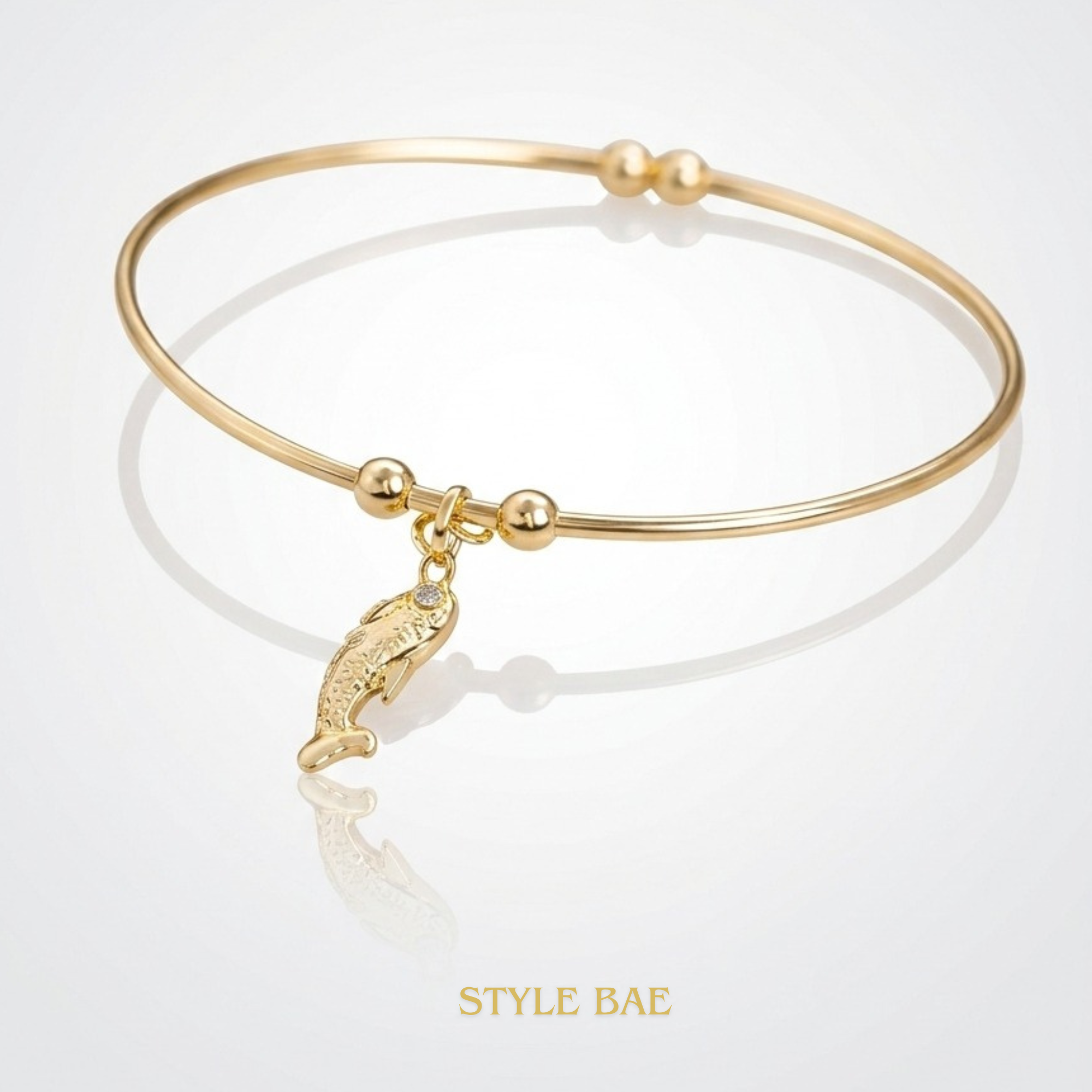 Gold Dolphin Charm Bracelet